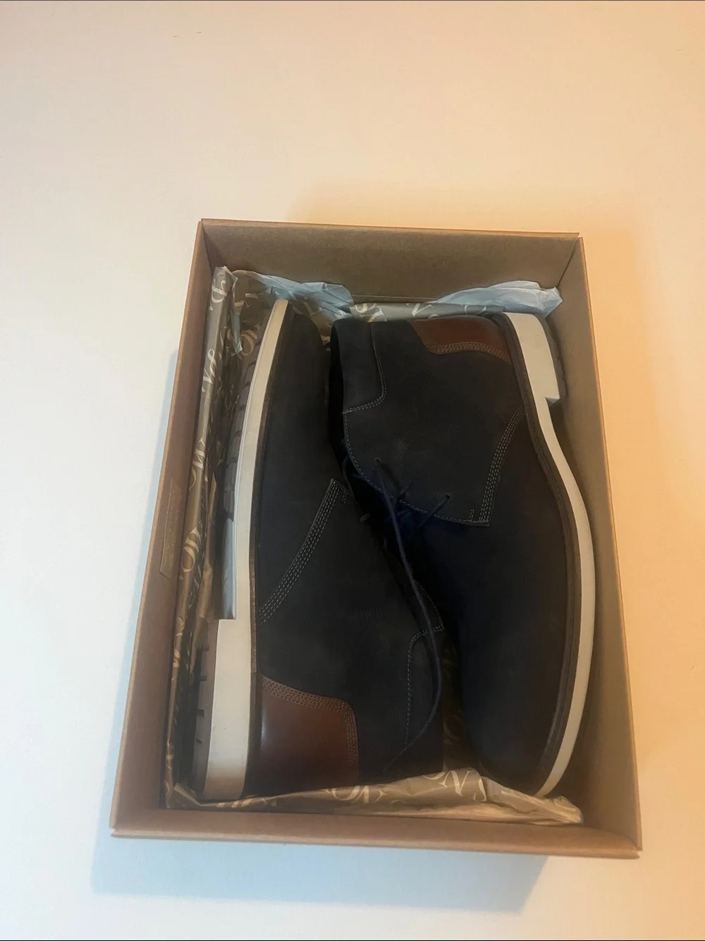 Men's  Johnston & Murphy Navy Chukka Boots with Brown Heel Accent, size 9M